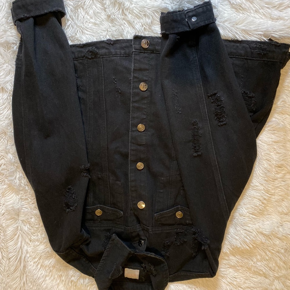 Distressed black denim jacket